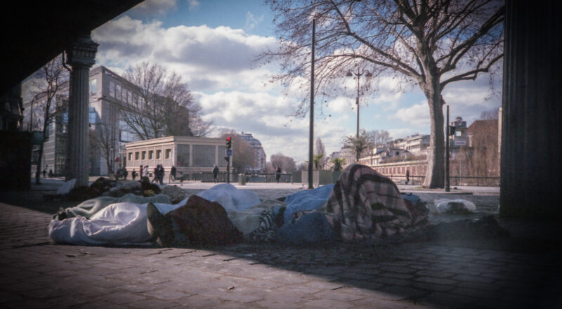 A photograph taken under a bridge in Paris. Taken with a Nikon L35AF using Fujicolor Colorplus 400 film.