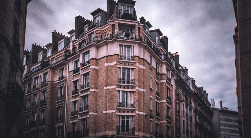 A photograph of an apartment building in Paris near the Eiffel Tower. Taken with a Nikon L35AF and Fujicolor 400 film.