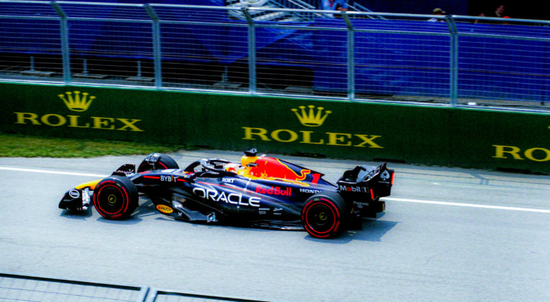 A photograph of Max Verstappen during the qualifying round of the 2023 Canadian Grand Prix in Montreal at the Circuit Jacques Villeneuve. Taken with a Canon F1New film camera using Kodak Ektar 100 Professional film.