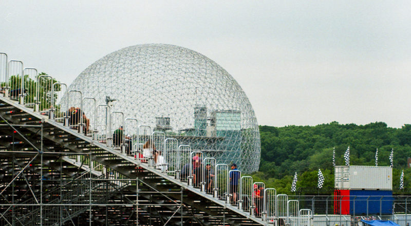 A photograph of a Montreal landmark during the qualifying round of the 2023 Canadian Grand Prix in Montreal at the Circuit Jacques Villeneuve. Taken with a Canon F1New film camera using Kodak Ektar 100 Professional film.