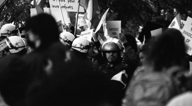 A photograph from the anti-LGBTQ+ rally in Montreal in 2023 of the resistance. Taken with a Canon F1New using CatLabs 320 film.
