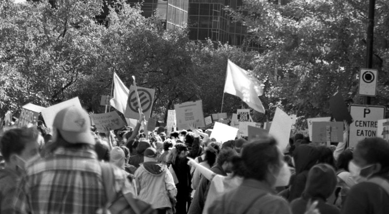 A photograph from the anti-LGBTQ+ rally in Montreal in 2023 of the resistance. Taken with a Canon F1New using CatLabs 320 film.
