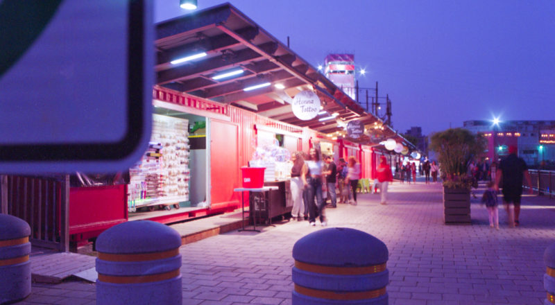 The pier at Montreal's Old Port at twilight, photographed using a Mamiya M645 1000S with Kodak Portra 800 film.